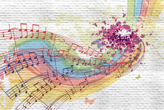 קיר בריקים עם גרפיטי מוזיקלי צבעוני
