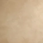 משטח בעל מרקם בגוון בז' עם דוגמה עדינה שמזכירה שיש טבעי.