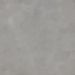 משטח אפור עם טקסטורה עדינה, גווני בטון והצללות קלות